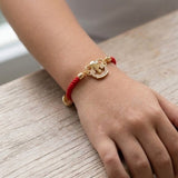 Premium Ganesha Charm Rakhi with Red Rope Band