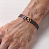 OM EVIL EYE CZ STONE RAKHI