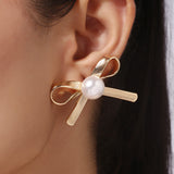 Big Bow Shape Gold Plated Eaarings with Shell Pearl